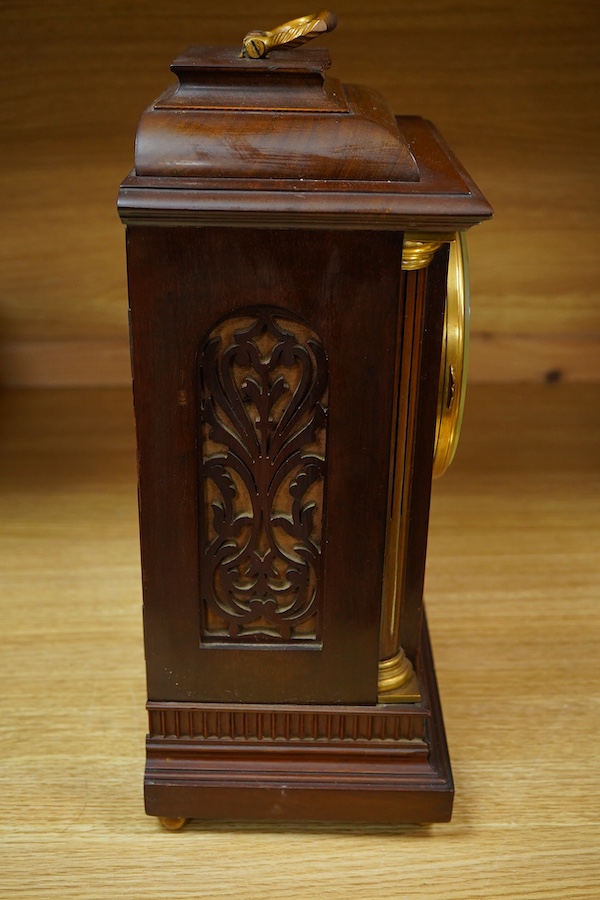 An early 20th century mahogany mantel clock, the dial inscribed Hyde & Sons, Sleaford, 41cm high